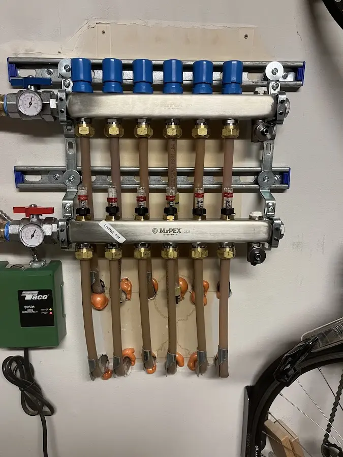 Plumber performing Water Heater Repair at a residential property in Mountainside